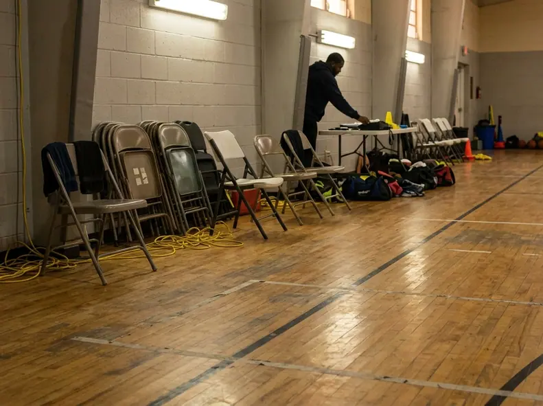 Athletic facility or training space showing a relocated basketball court setup in Bimini after storm